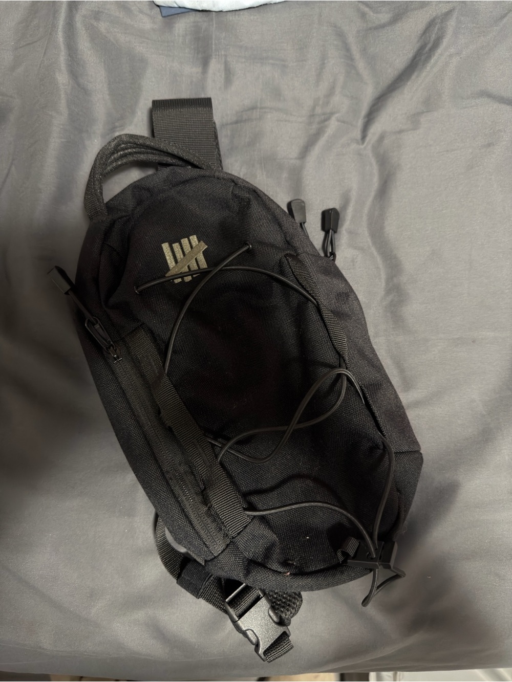 Undefeated mini crossbody bag